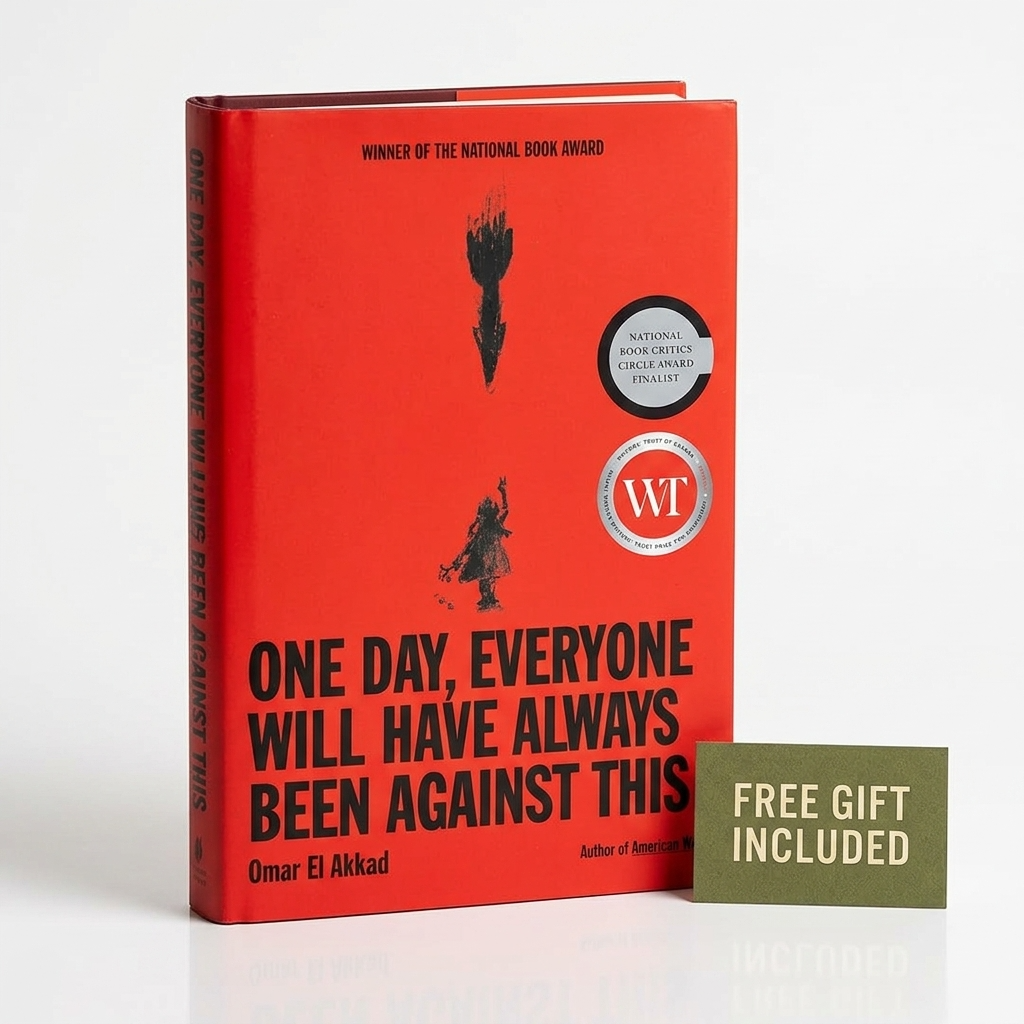 A hardcover copy of the book 'One Day, Everyone Will Have Always Been Against This' by Omar El Akkad, featuring a bright red cover with black text and award seals, shown next to a small green card that reads 'FREE GIFT INCLUDED' on a white background.
