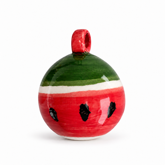 Watermelon hand-painted ceramic ornament isolated on a clean white background